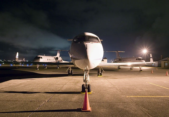A few of the roughly 5000 business jets that carry executive golfers to the